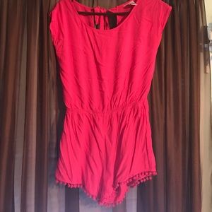 Hot pink romper with Pom Poms